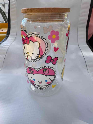 Cute Premium Glass Can with pink and yellow cartoon character faces, perfect for stylish and eco-friendly beverage storage.